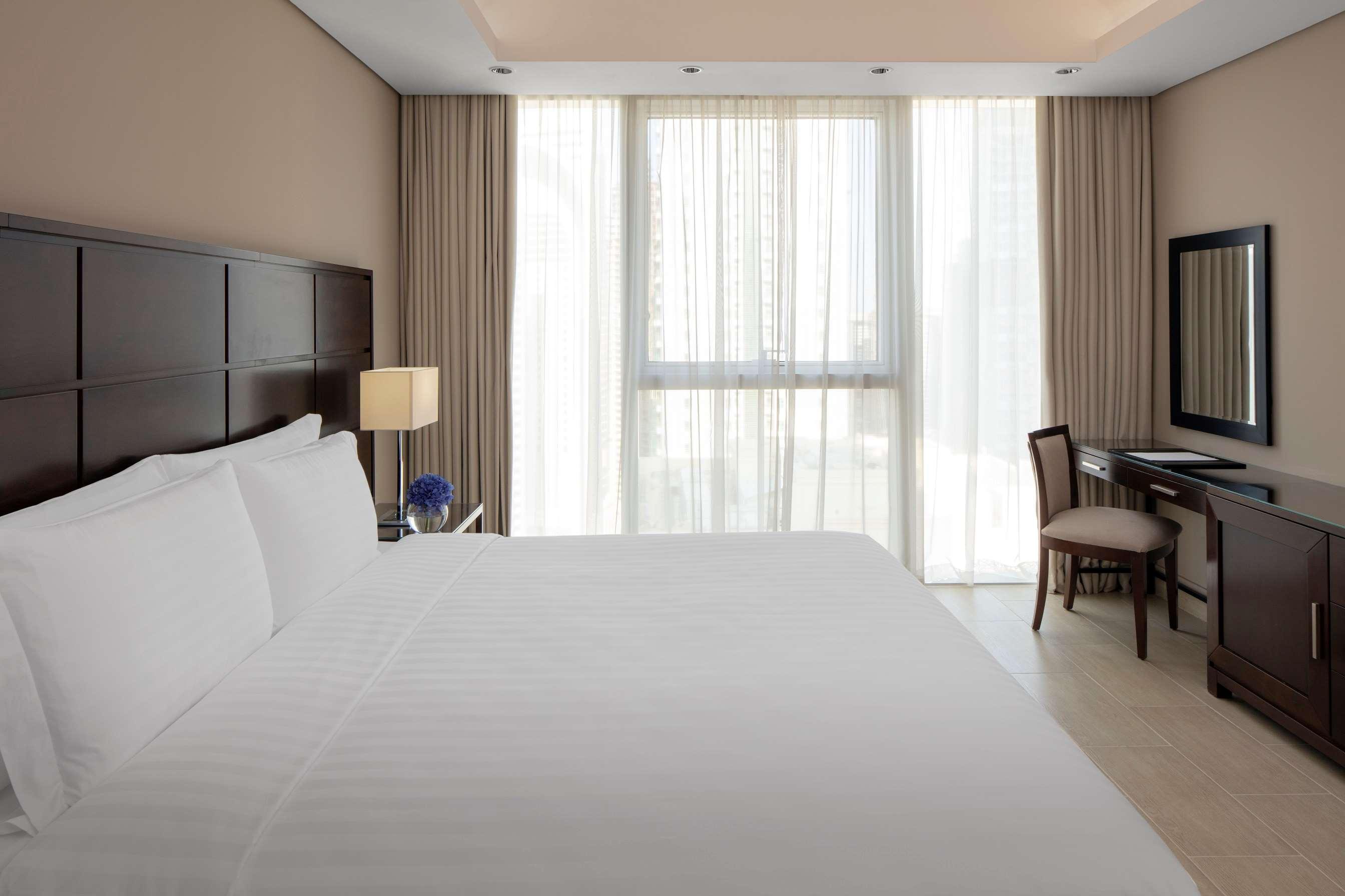 Dusit Doha Hotel Εξωτερικό φωτογραφία A bedroom at the hotel